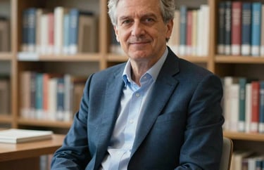 A professional portrait of an academic leader sitting in a modern library, International / Global, soft focus on books in the background, Steel Blue and Silver palette.