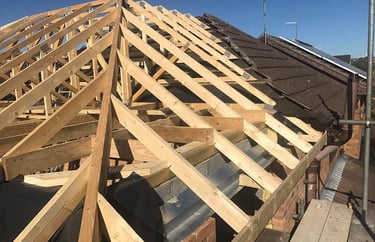 A total roof replacement including rafters, joists and beamjoists 