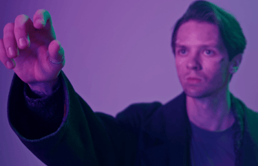 still picture of actor playing George' from the single of same name by Julian Sumner