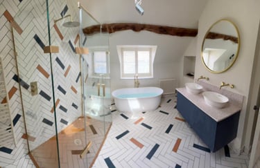 Contemporary bathroom with walk-in shower and stylish tiling installed in Evesham