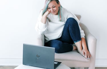 Tabitha with butterfly effect consulting with her laptop talking to a client