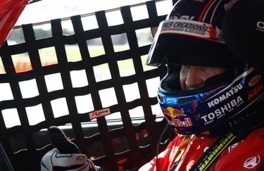 Race Car Diver behind window net NASA Member Benefits Motorsports Gear