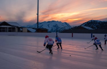 a group of people playing hockey on a field