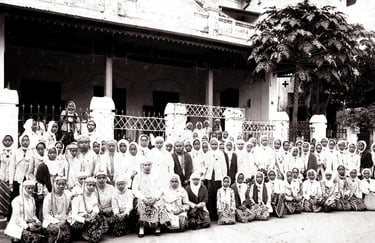 a group of people standing in front of a building