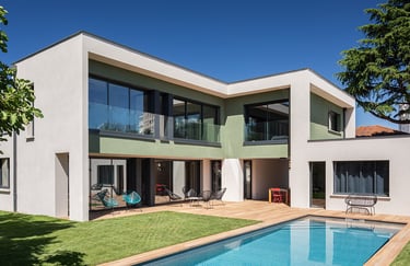 a house with a pool and a large pool