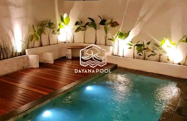 kolam renang minimalis dengan finishing batu alam