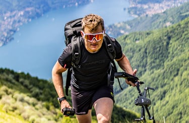 a man with a backpack on a mountain trail