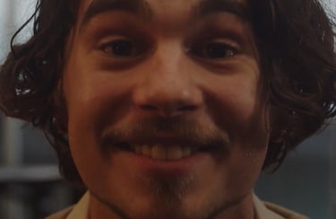 a man with a mustache and a beard