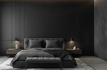 Modern minimalist black master bedroom with luxury charcoal bedding, sleek wall panels, and pendant lights.