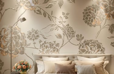 Elegant bedroom featuring a metallic floral textured wallpaper accent wall behind a modern upholstered headboard.