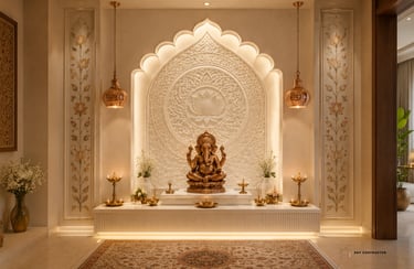 Elegant modern puja room with a golden Lord Ganesha idol, intricate wall carvings, and hanging lamps.