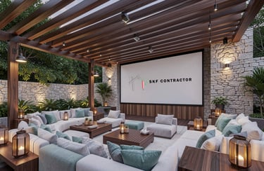 Luxury outdoor home theater with sectional seating, stone walls, and a wooden pergola for modern backyard living.