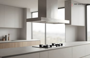 Modern minimalist kitchen featuring a stainless steel island range hood over a gas cooktop.