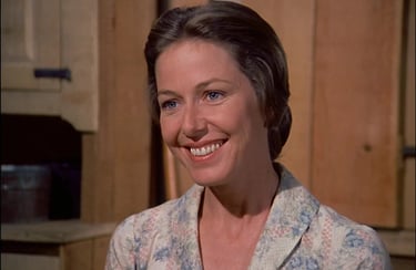 Karen Grassle as Caroline Ingalls from Little House on the Prairie