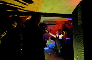 a man and woman singing in a band