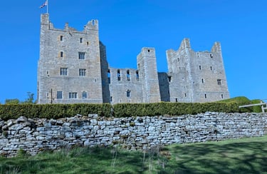 Bolton castle standing high on the hillside with great views of the hills and valleys