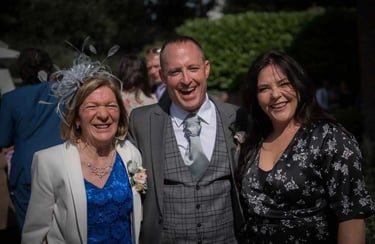 Groom at his wedding with friends