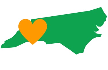 Green NC and orange heart over WNC representing Jack’s Locksmith local and reliable services in Marshall, NC