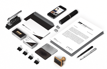 a variety of stationery items including a phone, pen and a pen