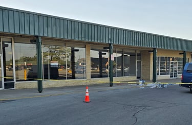 Prep, prime and repainting of storefront.
