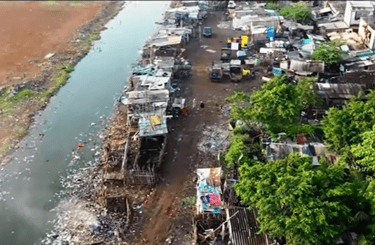 a river with a lot of garbage and a lot of trash