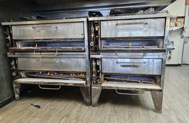 Appliance repair technician is repairing commercial oven Bakers Pride in Charlotte NC