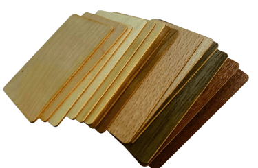 A stack of NFC card made of various wood colors and texture