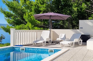 The photo shows a west sun terrace.