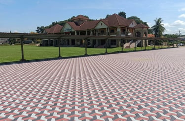 Commercial interlocking brick paving with turf lawn – Yie Yang Landscape