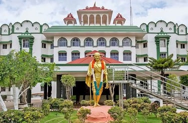 Madras high  court building in Tamil Nadu with Gandhi statue at entrance