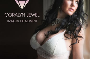 Coralyn on cover of her 2022 calendar wearing white lingerie