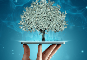 a person holding a tablet with money tree on it