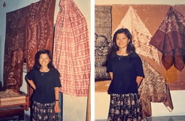 Kayoko standing in front of her fabric graduation work at Visva Bharati University.