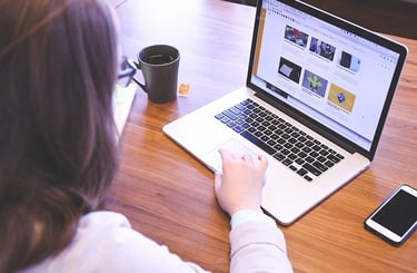 Woman doing websites on her laptop