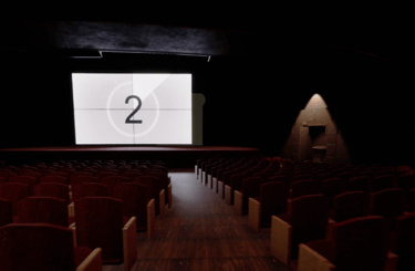Coded Black gameplay screenshot showing a dark movie theatre with the film about to start.