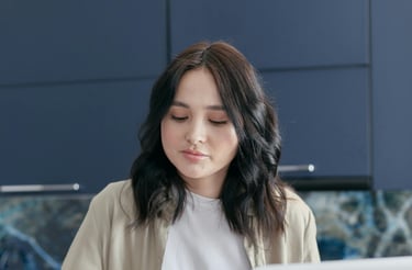 lady in office using her computer