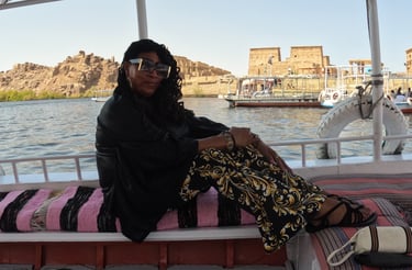 Davida Roze on a faluca on the Nile River at the Temple of Isis Aswan Egypt September 2022