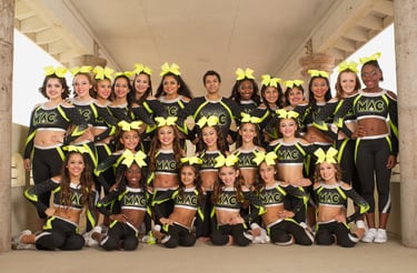 a group of cheerleaders posing for a photo
