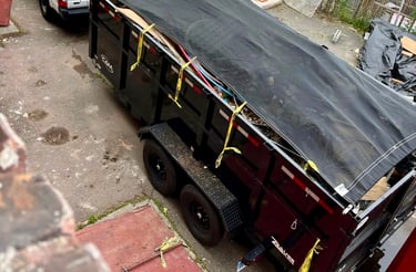 a truck with a tarp on it and a truck with a tarp on