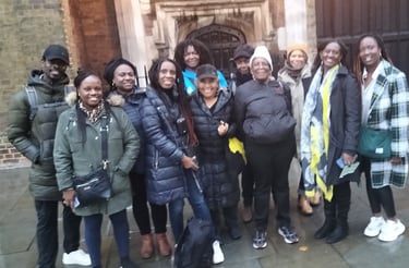 a group of people standing in front of St James's Palace