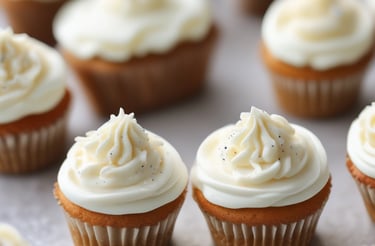A cozy kitchen scene with a tray of mini cupcakes and a handwritten greeting card beside a vintage teacup.