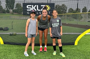 coach with 2 girls