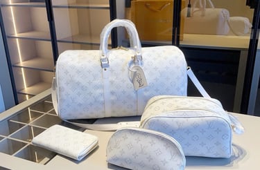 a white louis vuittououou baguett bag