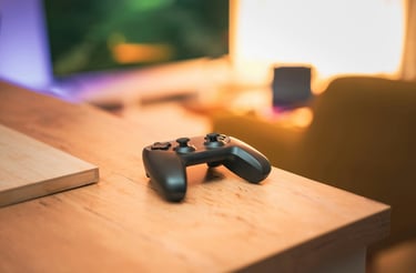 Video game controller on a wooden table