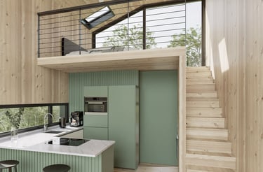 a kitchen with a staircase and a staircase leading to a loft