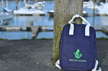 A picture of a backpack with 010personeel company logo