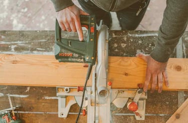 a man is using a circular sawdusted woodworking machine
