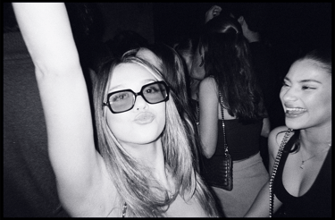 Girl dancing at Pass The Vibe party