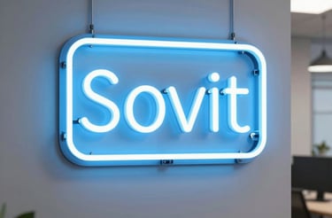 A friendly electrician in a branded Voltedge Electrical uniform answering a phone call in a bright, modern office.