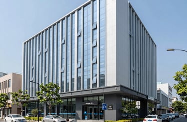 A friendly real estate agent smiling and ready to assist clients in a modern office setting.